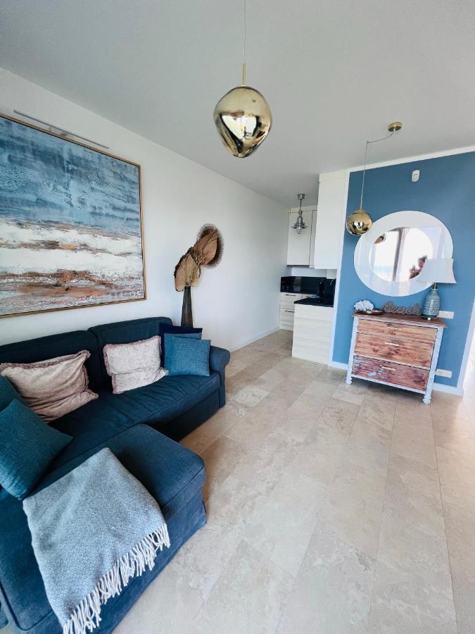 Sunnycliff Apartment Rewal Luaran gambar